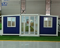 Conteneur de transport bleu, bureau portable, maison conteneur extensible de 20 pieds avec véranda latérale pour habitation résidentielle