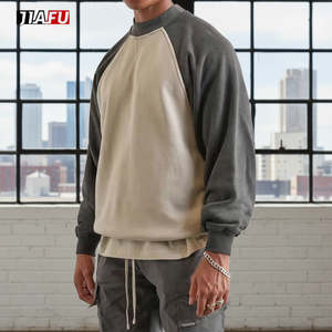 Sudaderas de algodón personalizadas al por mayor para hombre, con bloques de color, cuello redondo, manga raglán, puños y dobladillo acanalados, estilo casual urbano, en grandes cantidades. - Product Image 1
