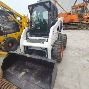Chargeuse compacte Bobcat S160 d'origine américaine avec godet de terrassement d'une capacité de 0,33 m³ et un poids opérationnel de 2,7 tonnes, en bon état. - Product Image 6