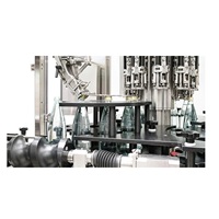 Machine de mise en bouteille de verre de qualité supérieure pour liquides non gazeux avec service personnalisé disponible en Inde