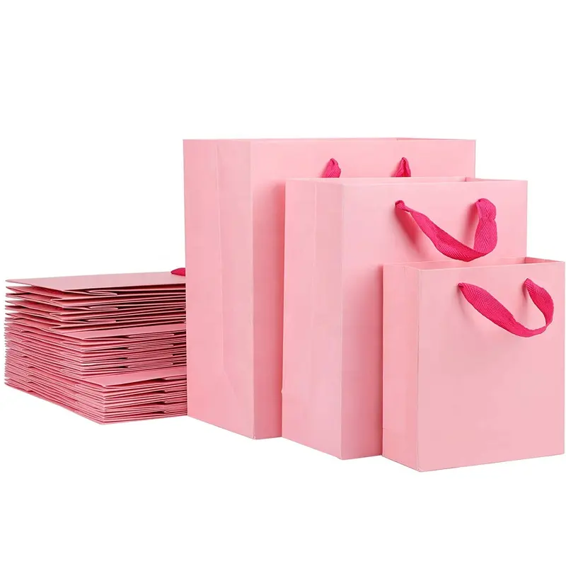 Розовые прочные бумажные пакеты ручной работы с логотипом для подарочной упаковки