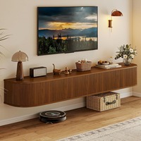 Meuble TV flottant personnalisé en noyer, style Mid-Century, avec portes rabattables sans poignée et bords arrondis pour salon
