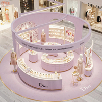 Kiosque de parfum rose haut de gamme Centres commerciaux personnalisés Vitrine de parfum en forme d'arc Fabricant