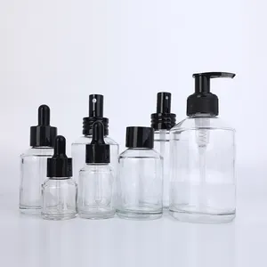 Venta al por mayor transparente 15ml 30ml 60ml 100mL 120ml 200ml botella de vidrio de aerosol de niebla de perfume de hombro inclinado con rociador negro