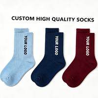 Chaussettes professionnelles pour jeunes de haute qualité à faible MOQ, fabriquées en usine, avec design de logo unique, étiquettes personnalisées et emballage sur mesure.