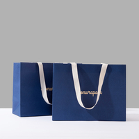 Tas Kertas Kraft Besar Custom LionwrapacK dengan Pegangan, Tas Belanja untuk Kemasan Ritel, Tas Kertas Grosir Pakaian