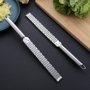 Rallador de queso de acero inoxidable, herramienta de cocina multifuncional para queso, limón, chocolate, patatas, apto para lavavajillas - Product Image 1