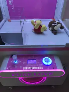 Mainan yang dioperasikan koin mesin permainan penangkap boneka Toda mesin cakar derek arcade