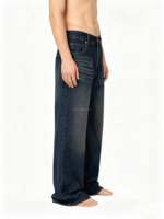 Jeans en denim délavé effet vieilli coupe ample et large pour homme – Vente en gros de vêtements personnalisés pour hommes