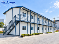 VICDOWEX Bâtiment préfabriqué de luxe en forme de T, isolation thermique, conception ignifuge pour bureaux de projets et personnel à long terme