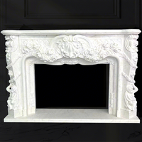 Cheminée décorative d'intérieur en marbre blanc de style européen et français avec sculptures rondes faites à la main