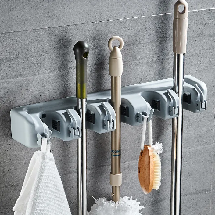 Supporto per scopa personalizzato Punch cucina stoccaggio multifunzionale perforazione installazione bagno supporto per scopa a parete in plastica