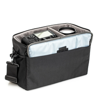 Organisateur d'équipement photo noir avec compartiments ajustables, couvercle en maille transparente, poche latérale et rangement frontal pour la photographie