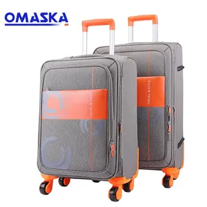 OMASKA 2020 proveedor profesional al por mayor de color 4 ruedas 4 PCS conjunto tela carro maleta de viaje bolsa de equipaje