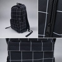 Sac à dos scolaire Oxford 300D noir et blanc à carreaux avec poche avant et fermeture éclair pour le campus et l'usage quotidien