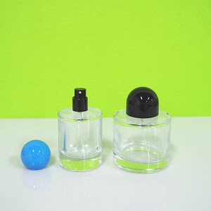 Botella de vidrio de perfume de lujo con base gruesa y tapa redonda, cilíndrica, vacía, para cosméticos, de 30 ml y 50 ml. - Product Image 1