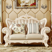 Canapé de luxe européen de style antique, design personnalisé par le fabricant, en cuir véritable doré, ensemble de canapés classiques pour villa