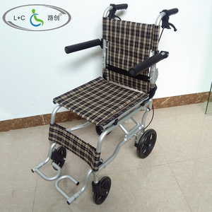 Fauteuil roulant manuel pliable léger L+C pour les voyages et l'utilisation en avion, avec frein en U et siège en tissu à carreaux - Product Image 1