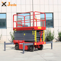 Plateforme de travail en hauteur mobile à ciseaux hydraulique mobile de 4 à 18 m, type électrique, avec batterie, avec certification CE