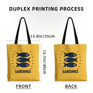 Sac à main à motifs avec une grande capacité. Il présente un motif de poisson sur un fond orange avec du texte sur les sardines et des écailles bleues - Product Image 3