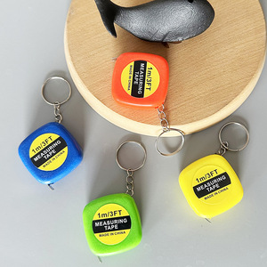 ตลับเมตรเหล็กขนาดเล็ก 1 เมตร แบบเมตริก ยืดหดอัตโนมัติ พร้อมพวงกุญแจ ผลิตในจีน - Product Image 1