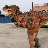 Costume de Carnotaurus animatronique fait main à vendre ou tenues interactives sur le thème des dinosaures pour parcs extérieurs