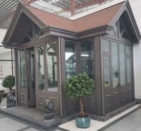 Véranda moderne en aluminium 4 saisons avec toit à pignon, verre double vitrage, solarium et serre