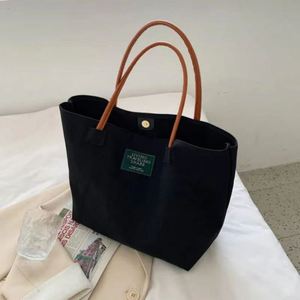 Elegante Bolso Tote de Lona de Algodón con Asas de Cuero, Bolso de Compras con Estilo - Product Image 1