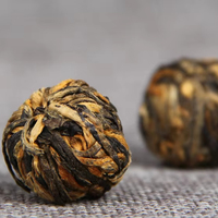 Eenvoudige verpakking cadeaudoos Verfrissend en anti-vermoeidheid Golden Yunnan Dianhong Dragon Balls