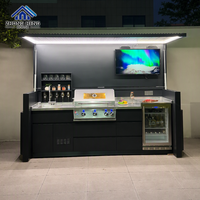 Station de cuisine extérieure modulaire de luxe résistante aux intempéries avec réfrigérateur, évier et auvent LED motorisé – Pod de cuisine extérieure moderne