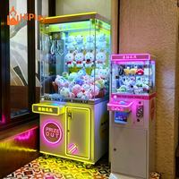 Kommerzieller Münzbetriebener Greifautomat Rosa Mini-Spielzeugautomat für Einkaufszentren und Vergnügungsparks