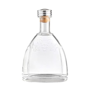 Bouteille de brandy en verre cristal blanc de luxe haut de gamme, bouchon couronne, capacité 1000 ml, finition mate, logo personnalisé, pour liqueur et <span class=keywords><strong>tequila</strong></span> - Product Image 1