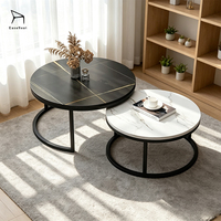 Table à manger ronde minimaliste moderne avec structure en acier inoxydable pour salon