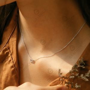 Nuova Collezione Gemnel: Collana con Pendente a Doppio Cuore Intrecciato in Argento 925 Placcato Oro con Diamanti - Product Image 2