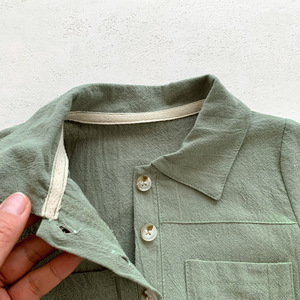 夏の男の子半袖ロンパースソリッドシングルボタンジャンプスーツ新生児服ポケット付き - Product Image 4