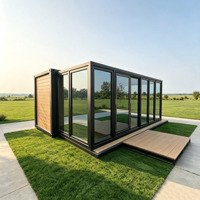 Maisonnette portable de haute qualité sur roues avec extension latérale coulissante et murs vitrés à vue panoramique pour appartement individuel