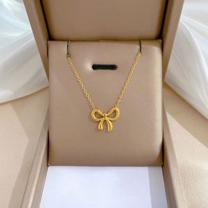 สร้อยคอจี้รูปโบว์ทอง 18K พร้อมจี้สแตนเลสสตีลสำหรับผู้หญิง - Product Image 1