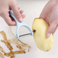 Poignée en plastique Gadget de cuisine Éplucheur de légumes Éplucheur de pommes de terre fruits portable