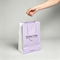 Sacs en papier biodégradables personnalisés avec logo en relief imprimé, sacs en papier kraft violet recyclables avec poignée