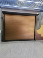 Portes à enroulement en acier compactes, gain de place au plafond, pour ateliers de production, usines et entrepôts