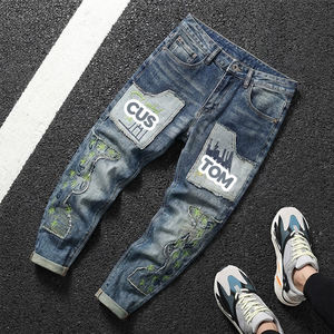 กางเกงยีนส์ทรงบอยเฟรนด์ผู้ชายแบบดิสเทรสพิมพ์ลาย กางเกงสั่งทำรุ่นใหม่ล่าสุด สไตล์ไฮสตรีท ระบายอากาศได้ดี กางเกงสกินนี่ กางเกงสเวตแพนท์ปักลายตามสั่ง - Product Image 1