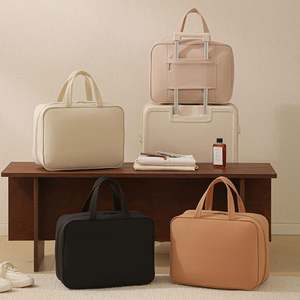 Nouvel ensemble de trousses de toilette de voyage de luxe 2025, écologiques, grand format, avec fermeture éclair, portables, brodées et imprimées, pour la vente en gros - Product Image 1