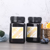 Großhandel Schwarz Dunkelbraun PET Quadrat Glas Weithals Kunststoff Honig behälter Mit Tamper Evident Cap für Süßigkeiten Verpackung