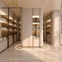 Comptoir de présentation de cosmétiques de luxe avec éclairage, vitrine de maquillage personnalisée, mobilier de magasin de cosmétiques