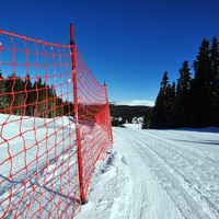 Filet de sécurité pour stations de ski en gros, filet de clôture rouge, filet de sécurité en plastique pour le ski, corde tressée en PEHD
