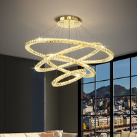 Lustre de salon en cristal multi-anneaux personnalisé, lumière circulaire moderne, luxe créatif, lampe suspendue en cristal pour hall duplex