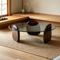 Meuble de salon design nordique à prix bas, table basse ronde avec plateau en verre et structure en bois massif