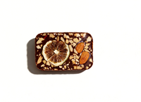 Chocolat noir aux fruits mélangés, aux noix, au citron et aux fruits secs