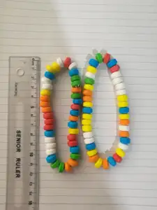 Collana di caramelle di destrosio confezionate singolarmente con perline colorate fruttate 19 g/pz 100 pz/borsa OEM disponibili con braccialetto caramelle