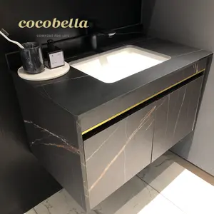 ตู้ห้องน้ำที่มีกระจกตู้โต๊ะเครื่องแป้งห้องน้ำไม้ราคาถูกที่ทันสมัยติดผนังโรงแรม Cocobella สี่เหลี่ยมผืนผ้าร็อคถั่ว